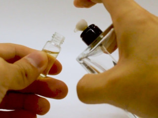 decanting perfume from spray bottle