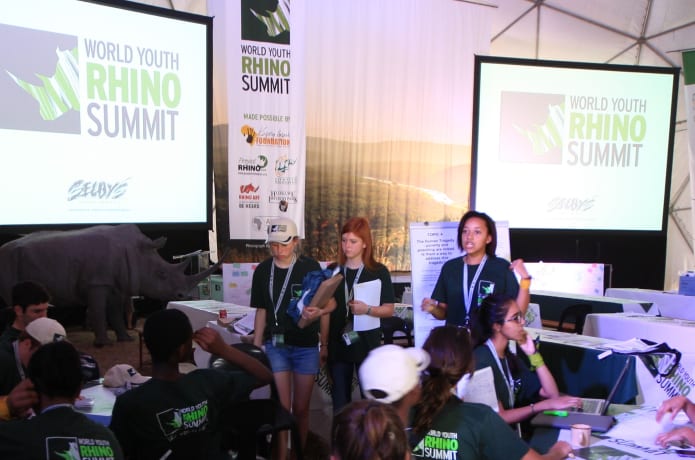 Kelly discussing and debating with fellow delegates at the World Youth Rhino Summit