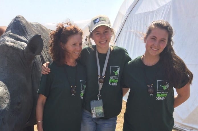 Jacomé in the middle with her teacher, Mrs Eckserley and friend, Monhé at the 2014 World Youth Rhino Summit