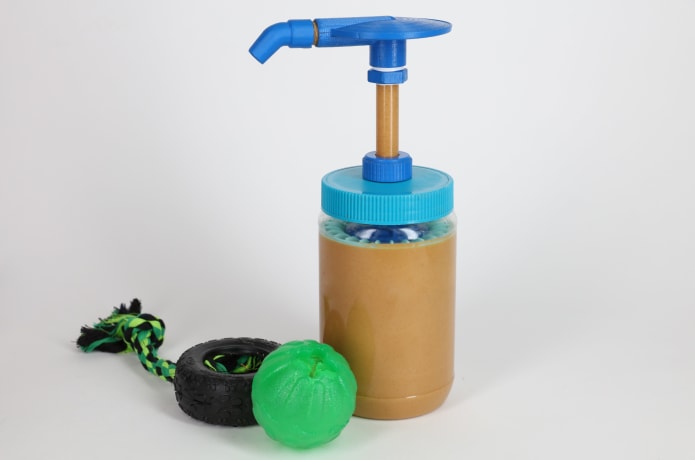 Fill your dog's favorite toys with a  special treat - peanut butter!