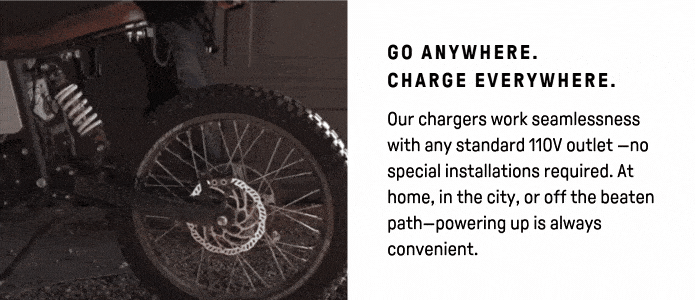 Close-up of a Terra Bike Prime wheel and charging cable. Text on the right reads: Go anywhere with our electric motorcycle. Charge effortlessly with any standard 110V outlet—no special installations needed, whether at home, in the city, or off-road.