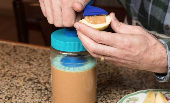 The Spinning Spread Scooper automatically cleans your peanut butter jars  hands-free! 