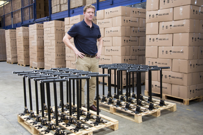 7 of the 21 pallets of hand pumps