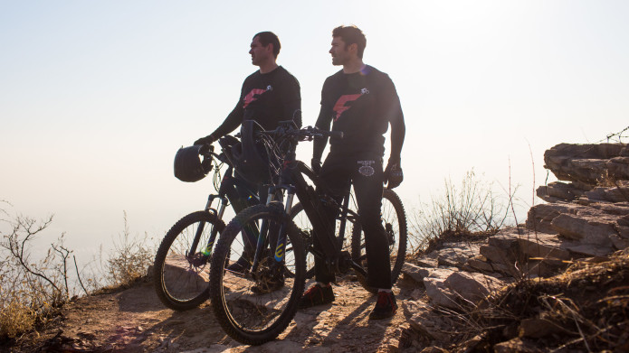 FLX Bike founders Rob Rast and Pete Leaviss on a Cliff - 2015