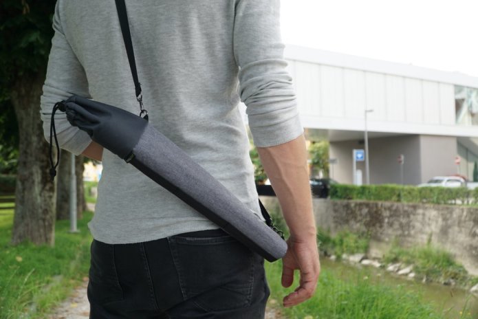 Lumapod Go 120 Travel Sling Pack in use