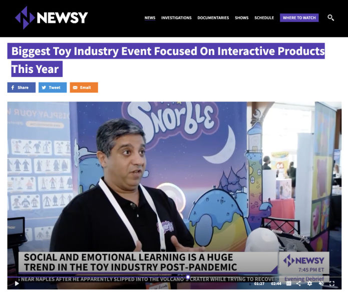 Image contains a screen capture of the Newsy website that shows a video of Mike Rizkalla, Snorble's CEO, doing an interview.